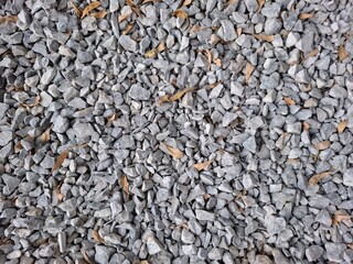 Gravel crushed stone and dry leaf texture, Material for groundcover or dressing up walkways and driveways.