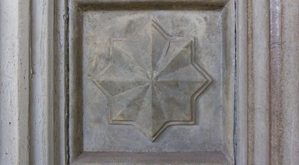 Eight-Pointed Star Relief or Cement Star Relief on Architectural Wall Panel with Ornate Frame Lines