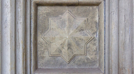 Eight-Pointed Star Relief or Cement Star Relief on Architectural Wall Panel with Ornate Frame Lines