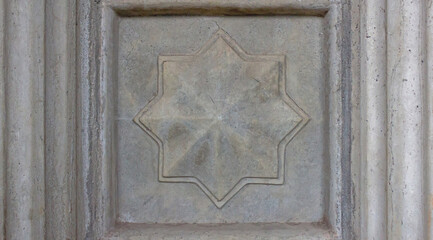 Eight-Pointed Star Relief or Cement Star Relief on Architectural Wall Panel with Ornate Frame Lines
