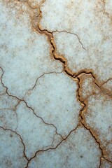 Obraz premium Close-up of a weathered marble surface with cracks and uneven finish, antique, aged, vintage