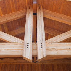 Construction particular of a new wooden truss structure called palladian truss with beams and wooden roof