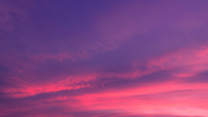 Pink, Purple , Pastel sunset sky background in the evening after sun down with colorful sunlight on Dusk sky clouds
