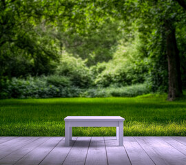 A serene setting featuring a simple white table against a lush green forest backdrop.