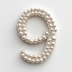 Obraz premium Number 9 made of elegant white pearls with a lustrous shine isolated on a clean white background