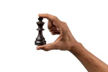 Male hand holding a chess king figure isolated no background cutout