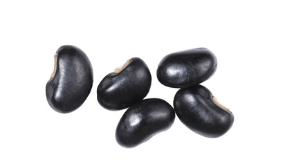 Black beans close up, isolated on white background, top view.	
