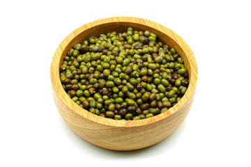 Mung bean (Vigna radiata) seeds in wooden bowl and wooden spoon isolated on white background