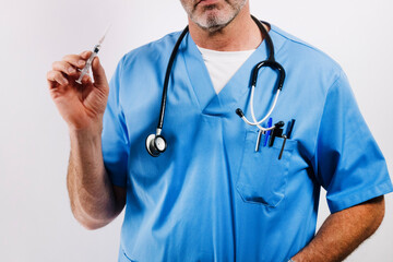 A doctor with medicine in his hand.