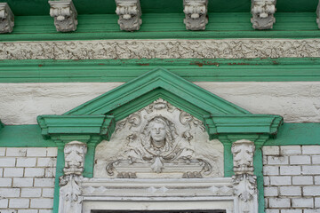 Decorative stonework element on the old building exterior © Pawparazzi