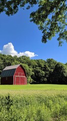 Red Barn in a Lush Green Field, a Peaceful Countryside Scene