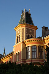 Tower on rectory building in Sombor in the sunset