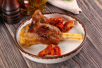 Baked lamb shank with vegetables
