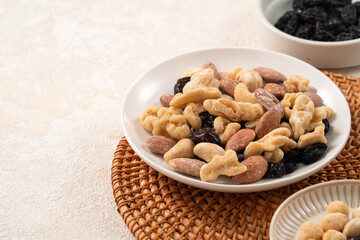 Flavored mixed nuts in bowls.