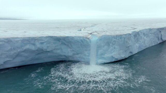 Icecap Arctic Meltwater Blue Channels Flowing To The Arctic Ocean, Aerial View