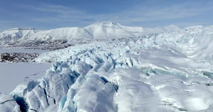 Arctic circle endless glaciers on a clear day, Aerial view