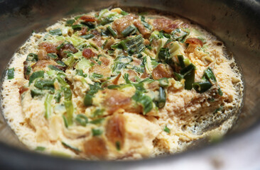 home cook steamed egg with chopped spring onion on top 