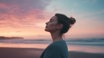 Shoulder stretch by a woman in a scenic beach setting. Featuring peace and flexibility
