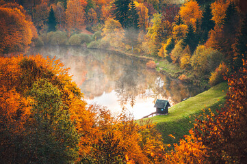 Autumn Lake in Banska Stiavnica, Slovakia. Pond called Banky in the middle of Fall