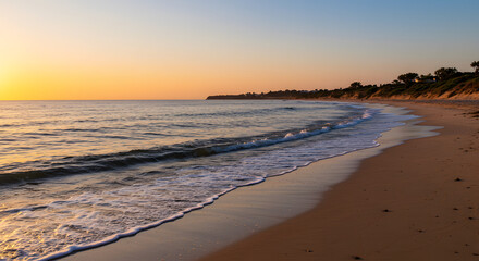 Golden Hour Beach Scene with Gentle Waves and Tranquil Atmosphere