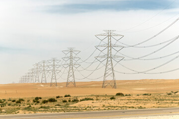 High-voltage power lines and high voltage electric transmission towers