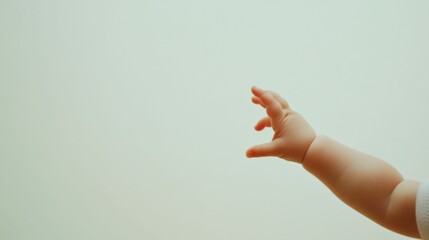 A close-up of a baby's hand reaching for a parent's finger, tender and loving vibe,