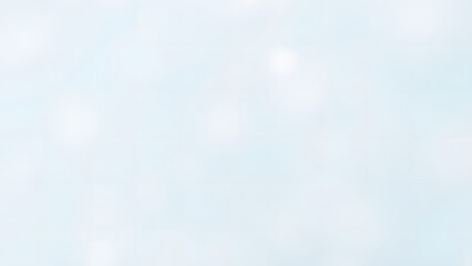 Soft blue sky with bokeh and blurred clouds