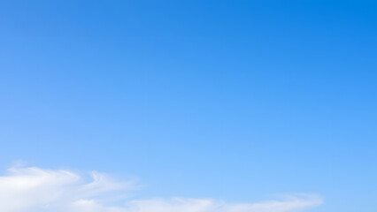 Obraz premium Beautiful blue sky with fluffy white clouds