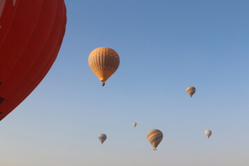Hot air balloons flying in Luxor in the morning, Egypt
