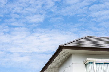 House roof under a clear blue sky