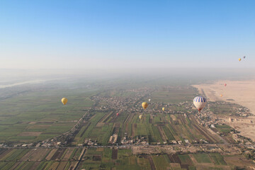 Crops on East bank of Luxor with the hot air balloons in the morning, Egypt