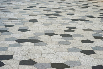 Perspective concrete block pavement. City sidewalk block or the pattern of stone block paving. Perspective block pavement or herringbone brick tile floor walkway. 