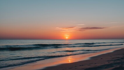 Obraz premium Tranquil Beach Sunset with Gentle Waves and Colorful Sky Reflection