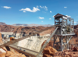 Hoover Dam with Observation Tower and Cables in USA, Desert Landscape