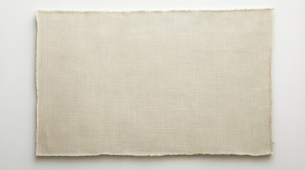 A neutral-toned, textured fabric with a frayed edge, perfect for artistic and design projects.