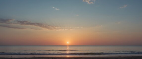 Fototapeta premium Serene Sunset Over the Ocean with Vibrant Sky Colors and Gentle Waves at Dusk
