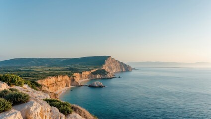 Fototapeta premium Scenic Coastal View from a Peninsula with Clear Blue Waters and Lush Green Cliffs Ideal for Nature and Travel Themes