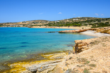 Koufonisia Fanos beach with clear water and rock formations. The south of Koufonisi. Small Cyclades, Greece