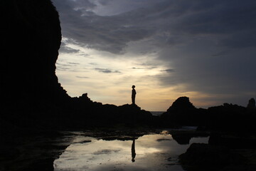 silhouette of a man on sunset