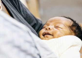 Tender embrace of an african newborn closeup photography home environment intimate viewpoint celebrating new life