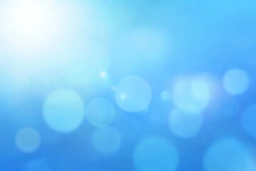 Soft Blue Background with Beautiful Bokeh Effects and Light Rays