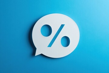 White speech bubble with percentage sign. Blue plain background, copy space. % Symbol percent. Seasonal sale, discount. Rate for finance. Investment ROI, credit, mortgage, tax, marketing, promotion