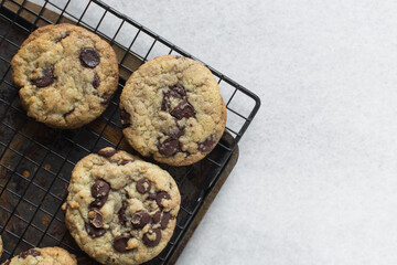 Overhead view of chocolate chip cookies, top view of homemade chocolate chip cookies on a white background