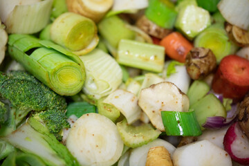 Close-up of chopped vegetables, including carrots, leeks, celery, and root vegetables, perfect for soup or stew.