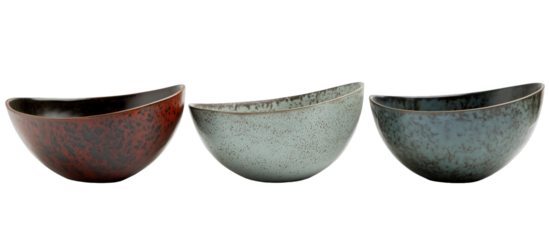 Elegant Ceramic Bowls: An artful display of three uniquely crafted ceramic bowls, each with distinct textures and hues, poised to elevate the dining experience.