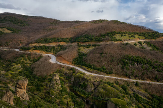 Winding Road through Meteora Monasteries in Autumn, Unesco Site, Greece