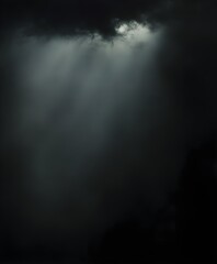Fototapeta premium Pitch black background with a minimal light