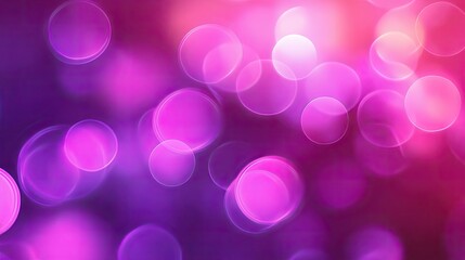An abstract background with soft, blurred edges and circular patterns in vibrant shades of purple and pink.