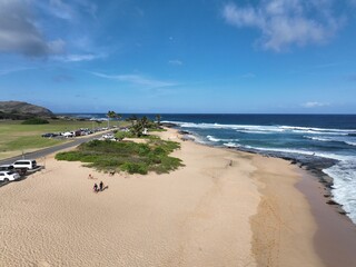 Sandy Beach Park: Turquoise Waves and Golden Sand