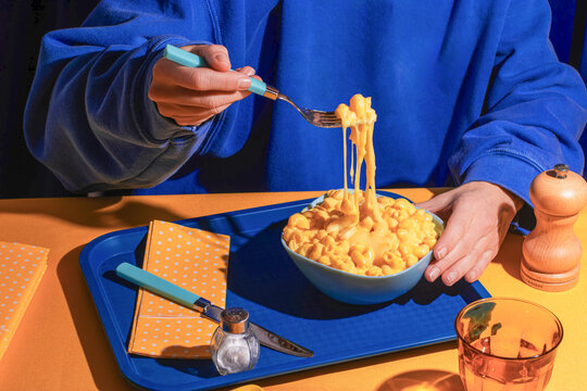 Delicious Macaroni and Cheese Being Savored in Cozy Setting